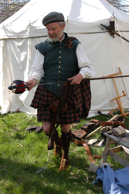 soldier with basket hilt broadsword